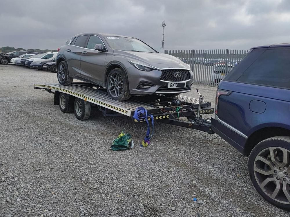 Car Auction Collection in Basildon: vehicle loaded by Nationwide Vehicle Transportation